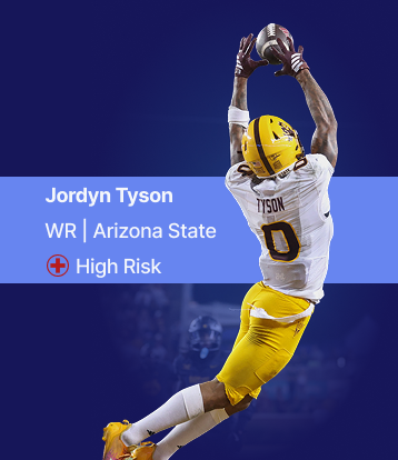 A picture of WR Jordyn Tyson leaping for a ball, with text next to it that looks like his player page details. It shows a High Risk injury designation (red cross).
