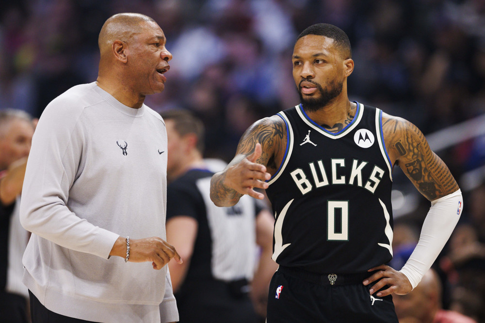 Doc Rivers talking to Damian Lillard