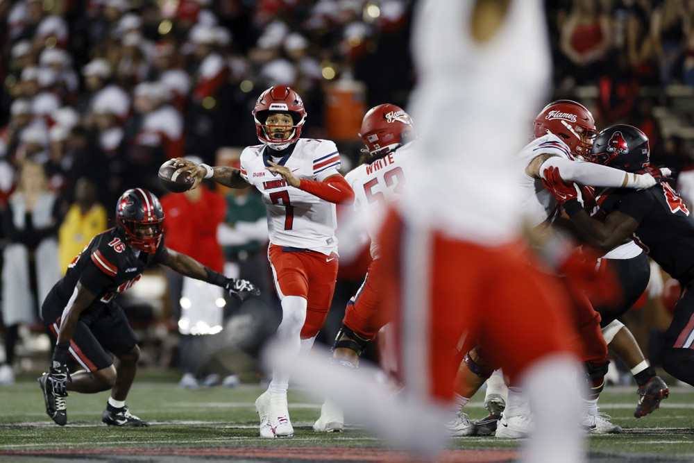 Kaidon Salter of Liberty prepares to throw a pass.