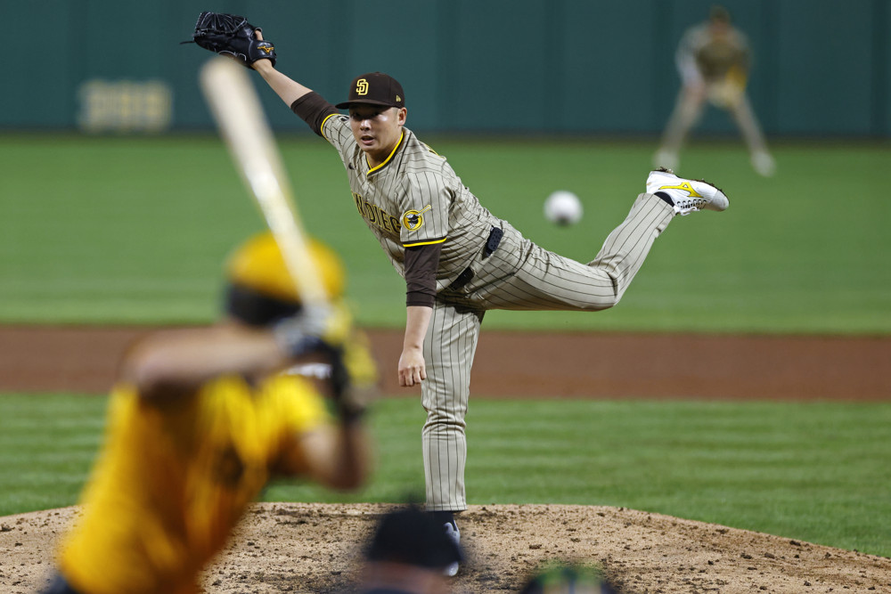 Padres left-handed pitcher Yuki Matsui following through on a pitch to a right-handed hitter.