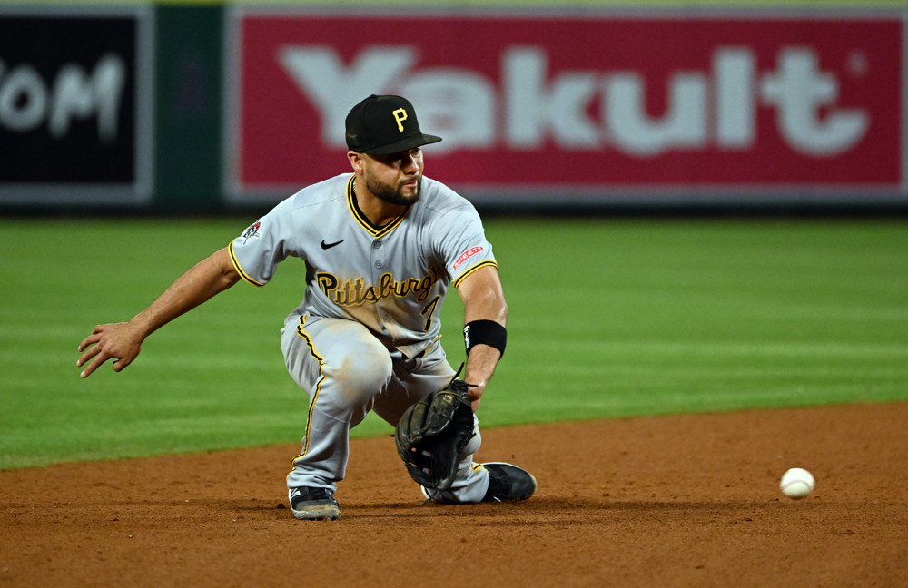 Pittsburgh Pirates shortstop Isiah Kiner-Falefa (7) gets ready to stop a ground ball with his backhand.