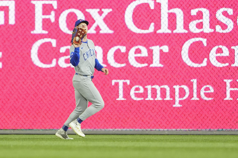 Pete Crow-Armstrong catches a fly ball