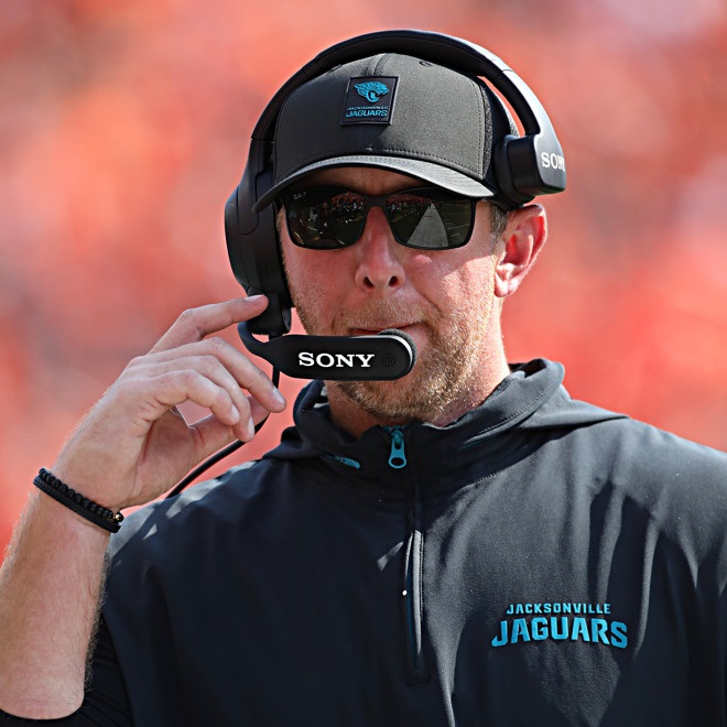 Jaguars coach Liam Coen listens on his headset