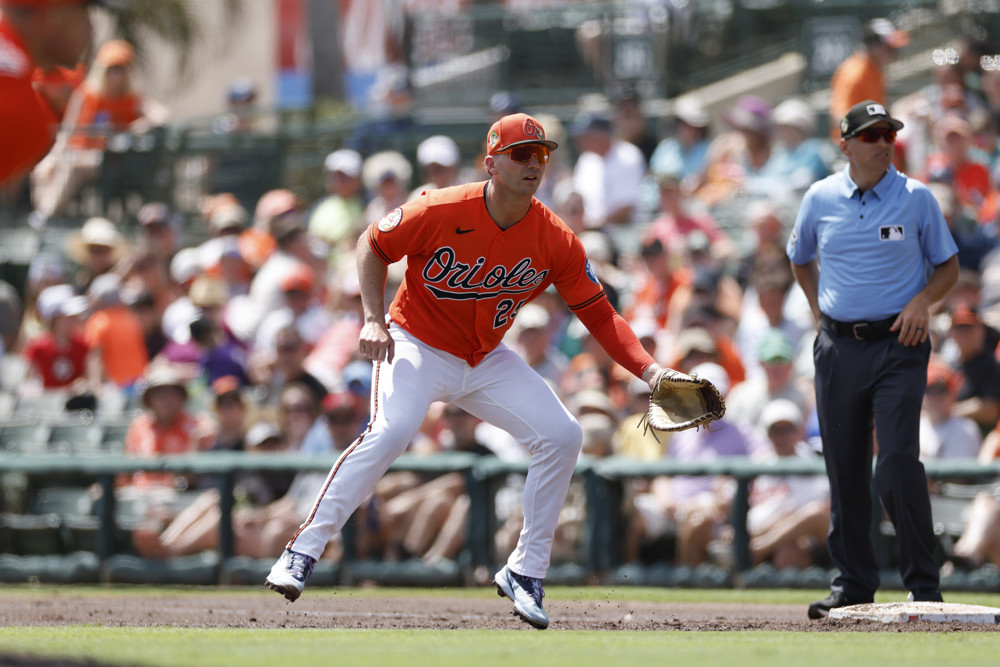 Jalen Duren, wearing a blue Pistons jersey with red No. 8, dunks with his right hand.