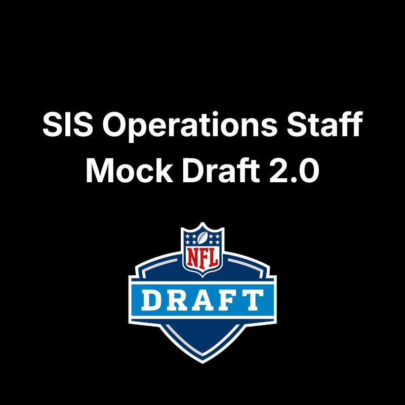 Jalen Duren, wearing a blue Pistons jersey with red No. 8, dunks with his right hand.